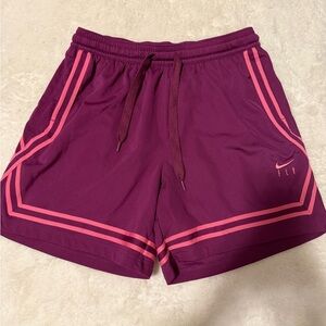Nike Women's Purple Athletic Shorts with Pink Accents